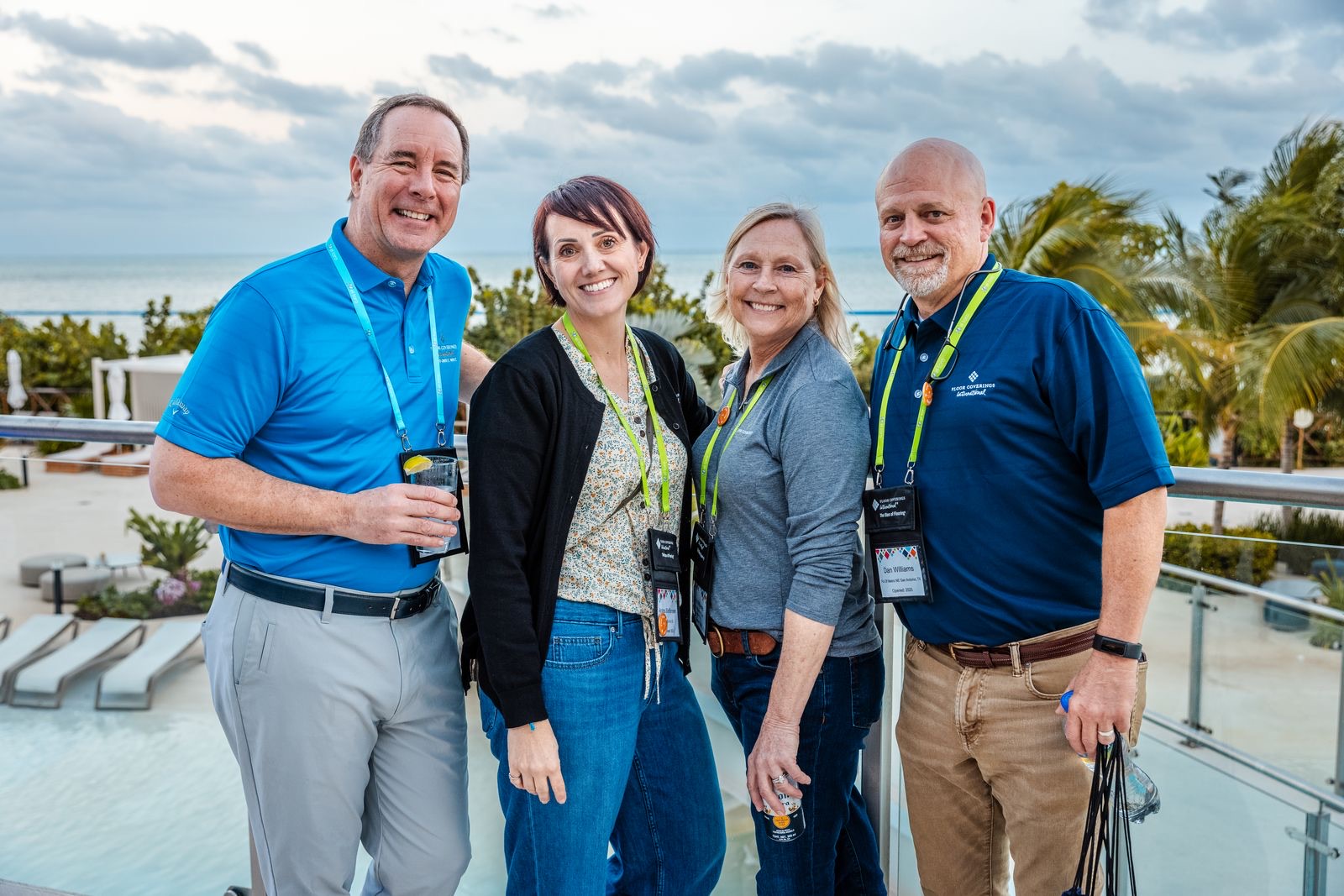 Convention attendees at a balcony reception