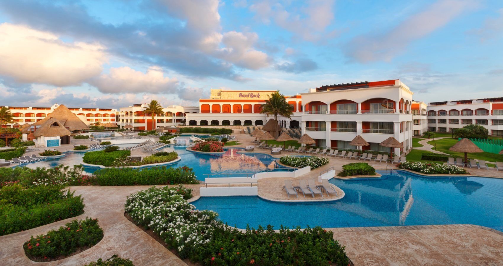 Hard Rock Riviera Maya pool surrounded by resort buildings