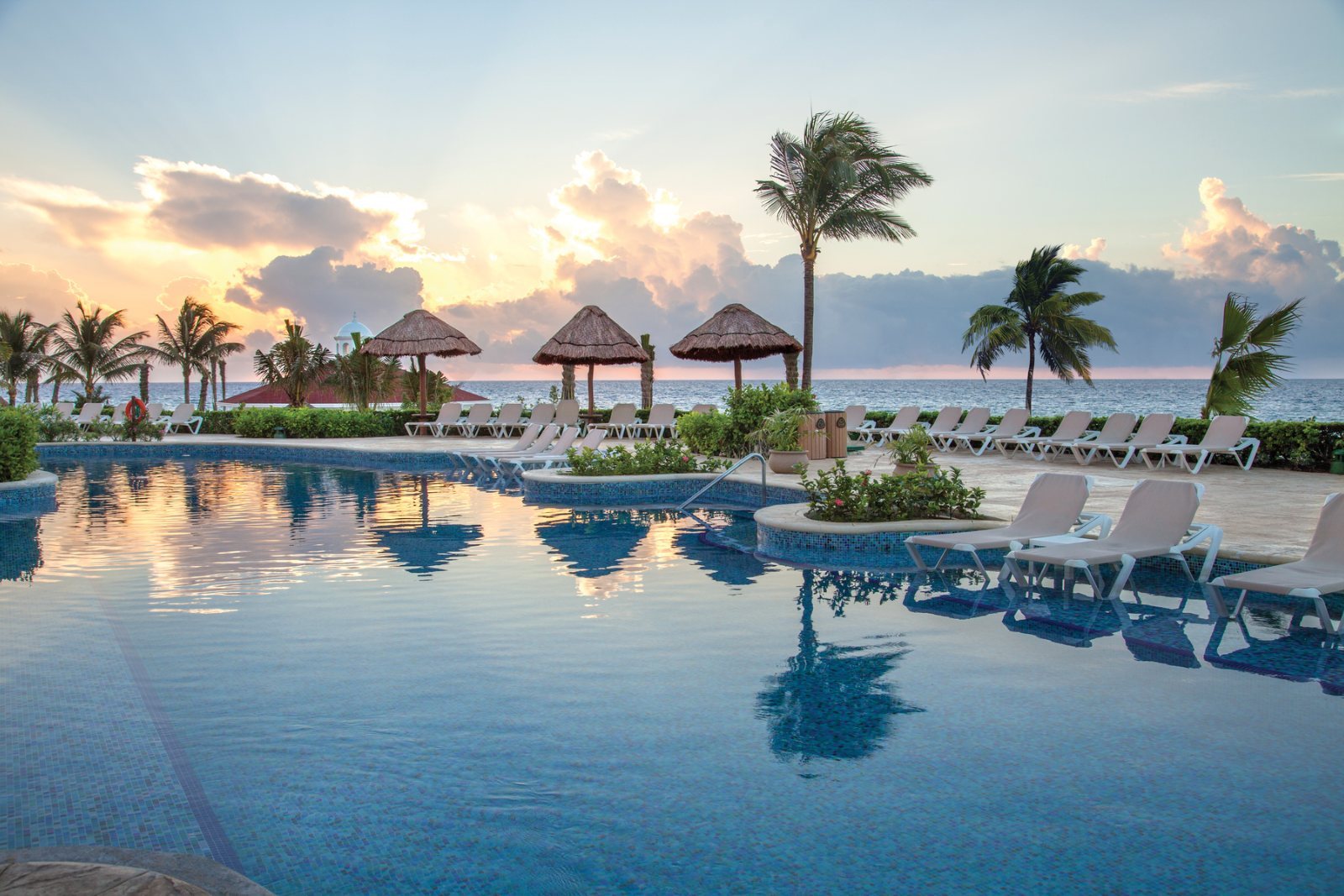 Pool at Hard Rock Riviera Maya during sunrise